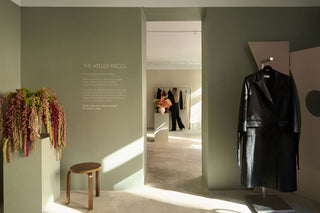 Inside the Lis Bonne Atelier pop-up at Linnégatan 42, Stockholm, with autumn flowers and the collection on display
